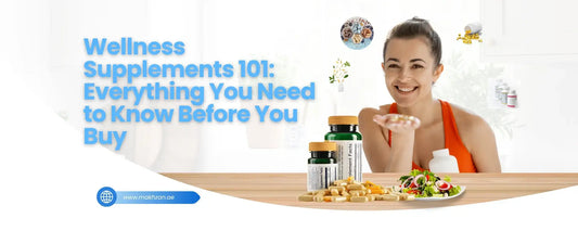 A woman smiling while holding pills, surrounded by wellness supplements and healthy food, emphasizing Wellness Supplements.
