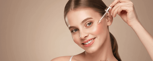 Woman applying a serum with a dropper, representing the Best Face Serum for My Skin Type.