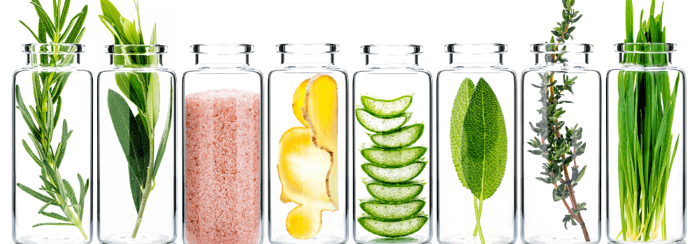 Natural Skincare Ingredients for Radiant Skin in glass jars, featuring herbs and natural elements.