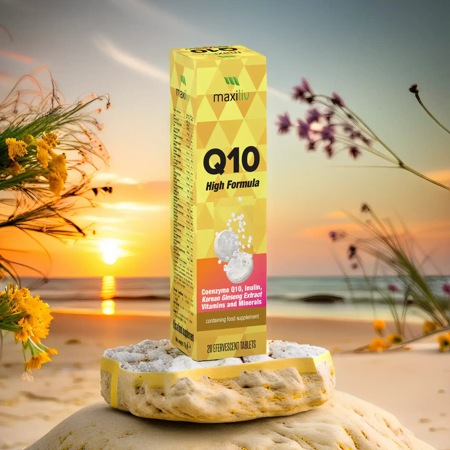 Maxiliv COQ10 High Formula packaging displayed on a beach with sunset and flowers, featuring effervescent tablets.