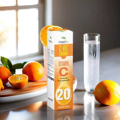 Maxiliv Vitamin C Effervescent tablets with orange and glass of water, promoting immune health.