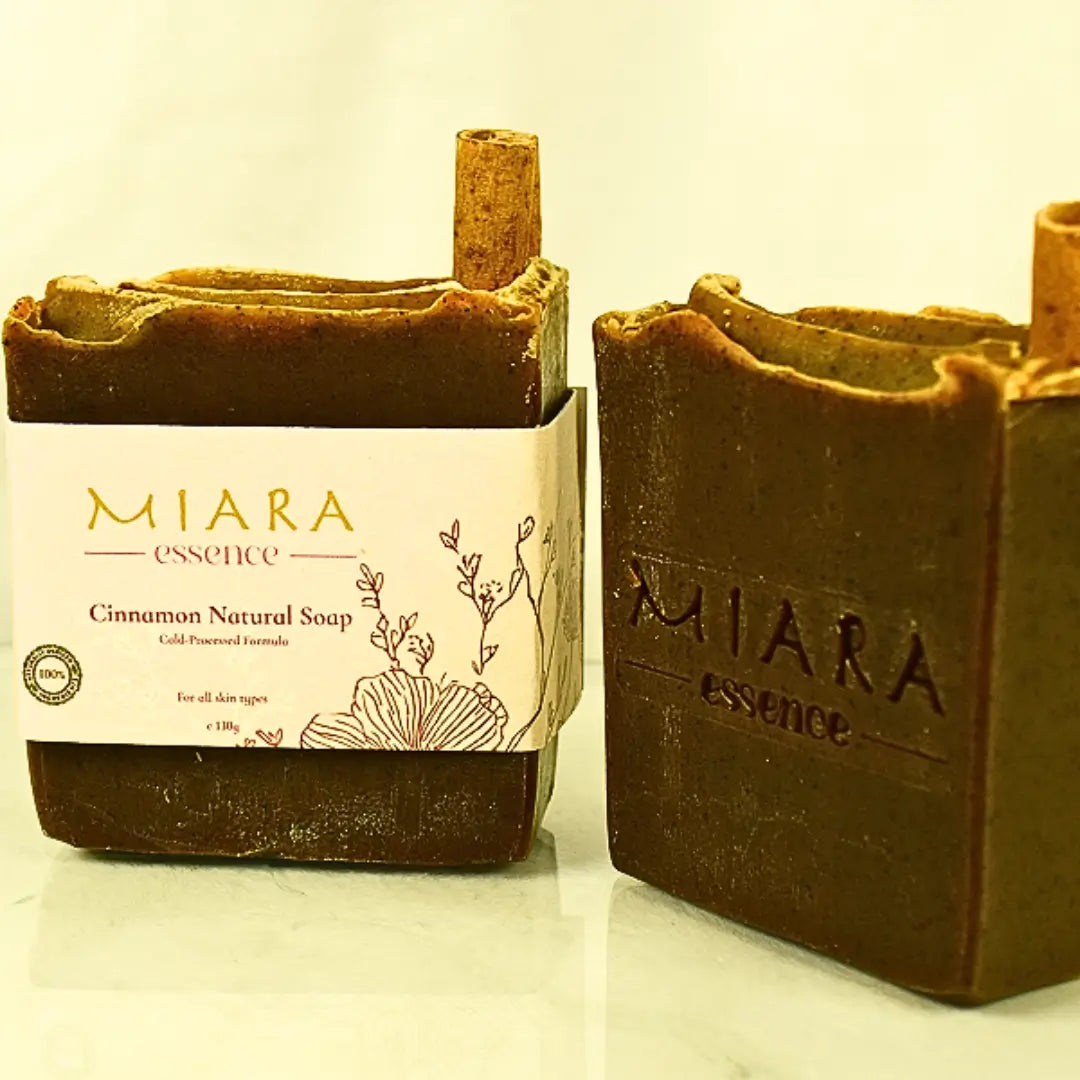 Two bars of MIARA essence cinnamon natural soap on a light background