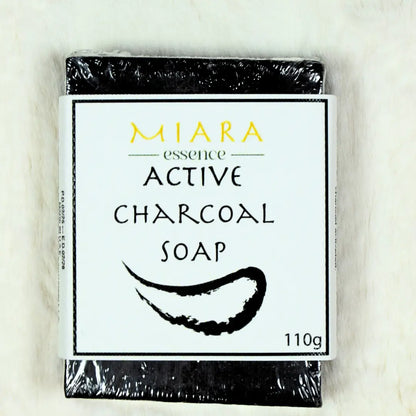 MIARA Essence Active Charcoal Soap. Activated Charcoal Bar Soap packaging on a light background