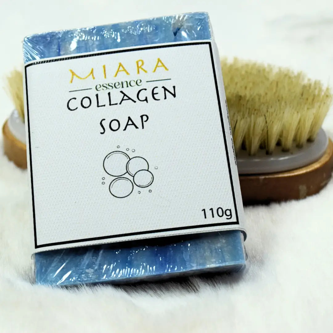 MIARA essence Collagen Soap natural packaging with a brush in the background