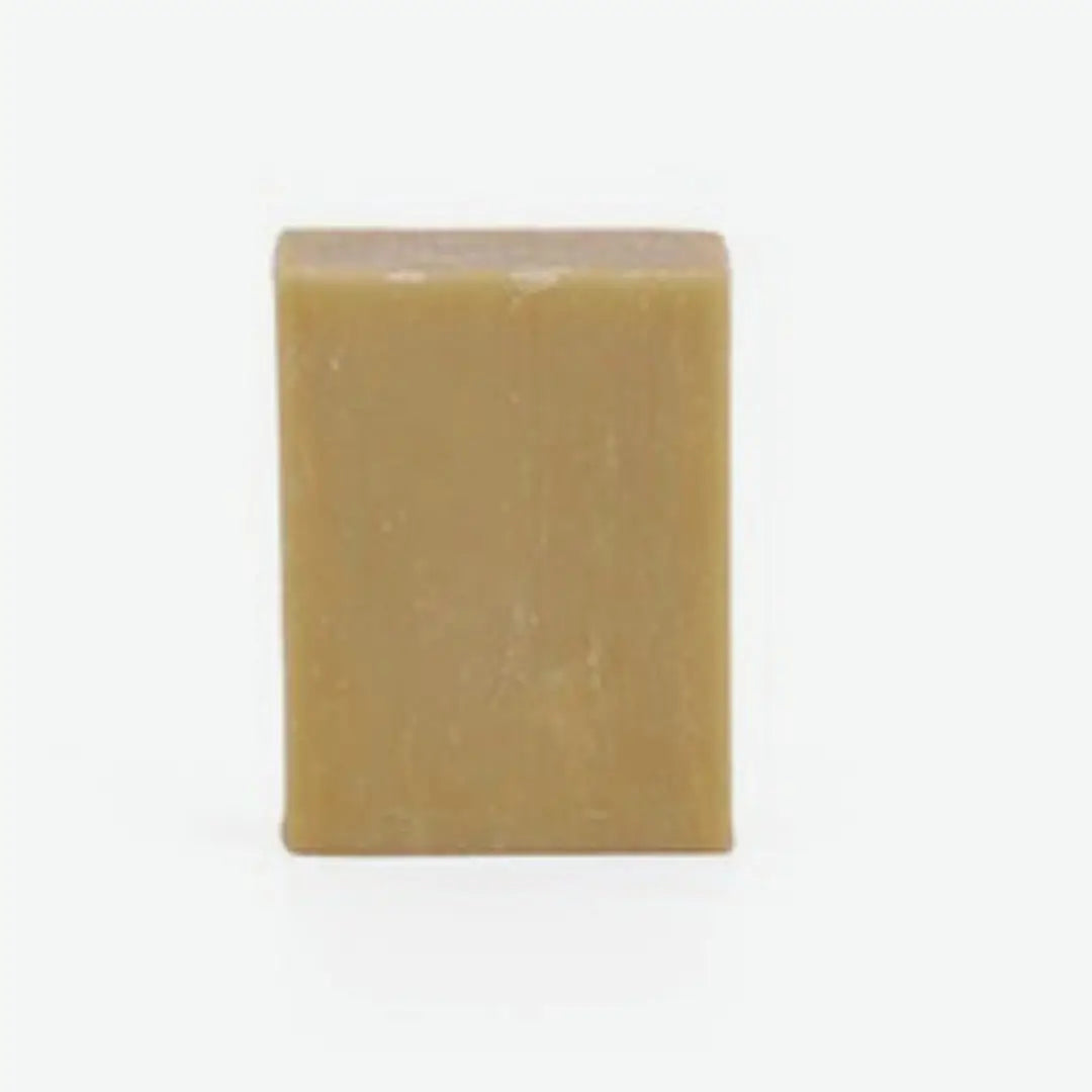 Square bar of Goat Milk soap on a white background