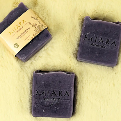 Miara Essence Indigo Natural Soap bars on a light background, showcasing natural ingredients for even-toned skin.